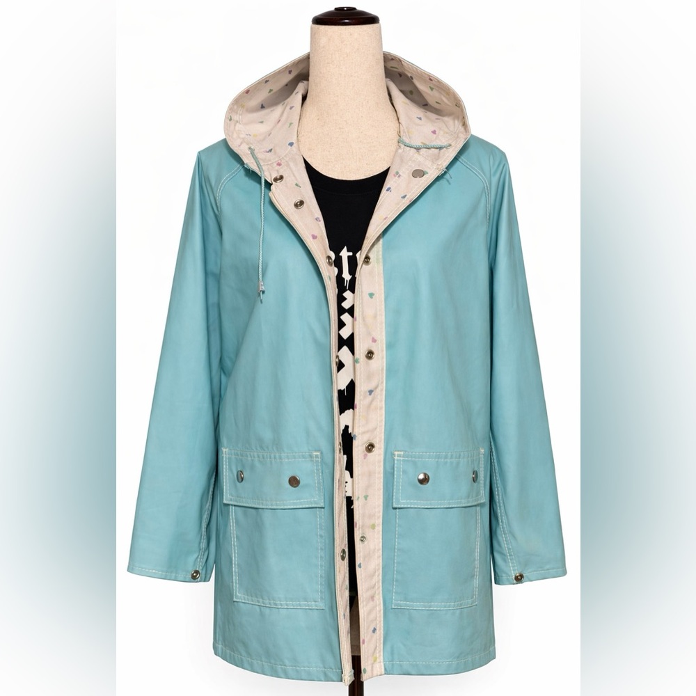Vintage 80s Reversible turquoise and hearts raincoat. M